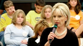 FILE - This Nov. 1, 2001 file photo shows host Bobbie Battista preparing for the airing of the show "TalkBack Live" in Atlanta.