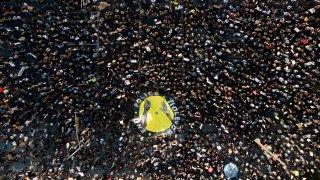 Demonstrators take part in a protest, Wednesday, June 3, 2020, in downtown Los Angeles, sparked by the death of George Floyd, who died May 25 after he was restrained by Minneapolis police.