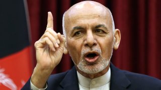 In this March, 1, 2020, file photo, Afghan President Ashraf Ghani speaks during a news conference in presidential palace in Kabul, Afghanistan. Squabbling Afghan presidential rivals threatened to declare themselves president in dueling ceremonies Monday, March 9, 2020, throwing plans for intra-Afghan negotiations into chaos.