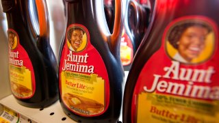 In this Aug. 3, 2011, file photo, bottles of PepsiCo Inc. Aunt Jemima syrup are displayed for sale at a ShopRite Holdings Ltd. grocery store in Stratford, Connecticut.