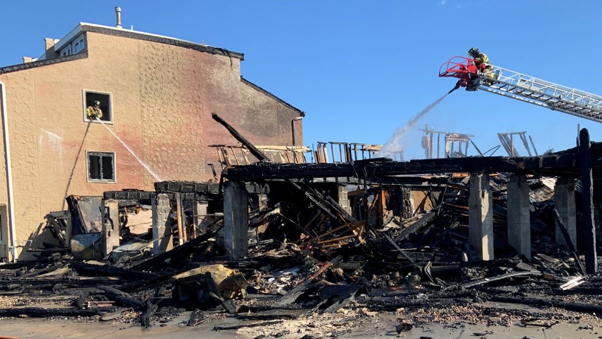 Firefighters Battle Windwhipped Flames as Blaze Guts Brigantine, New