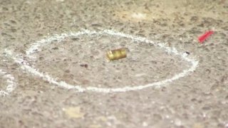 A bullet casing left on the ground after the shooting.
