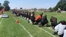 Camden Football Kneeling protest viewer pic
