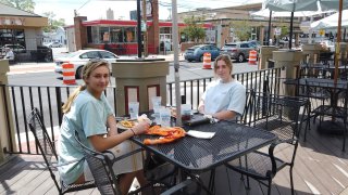 People dine out at a Newark, Delaware, restaurant on June 1, 2020