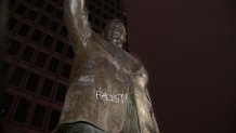 A statue of Frank Rizzo with the word facist tagged on it