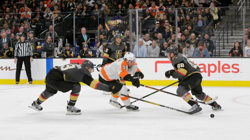 Vegas Golden Knights defenseman Brayden McNabb (3) and Philadelphia Flyers defenseman Ivan Provorov (9) battle for control of the puck during a regular season game