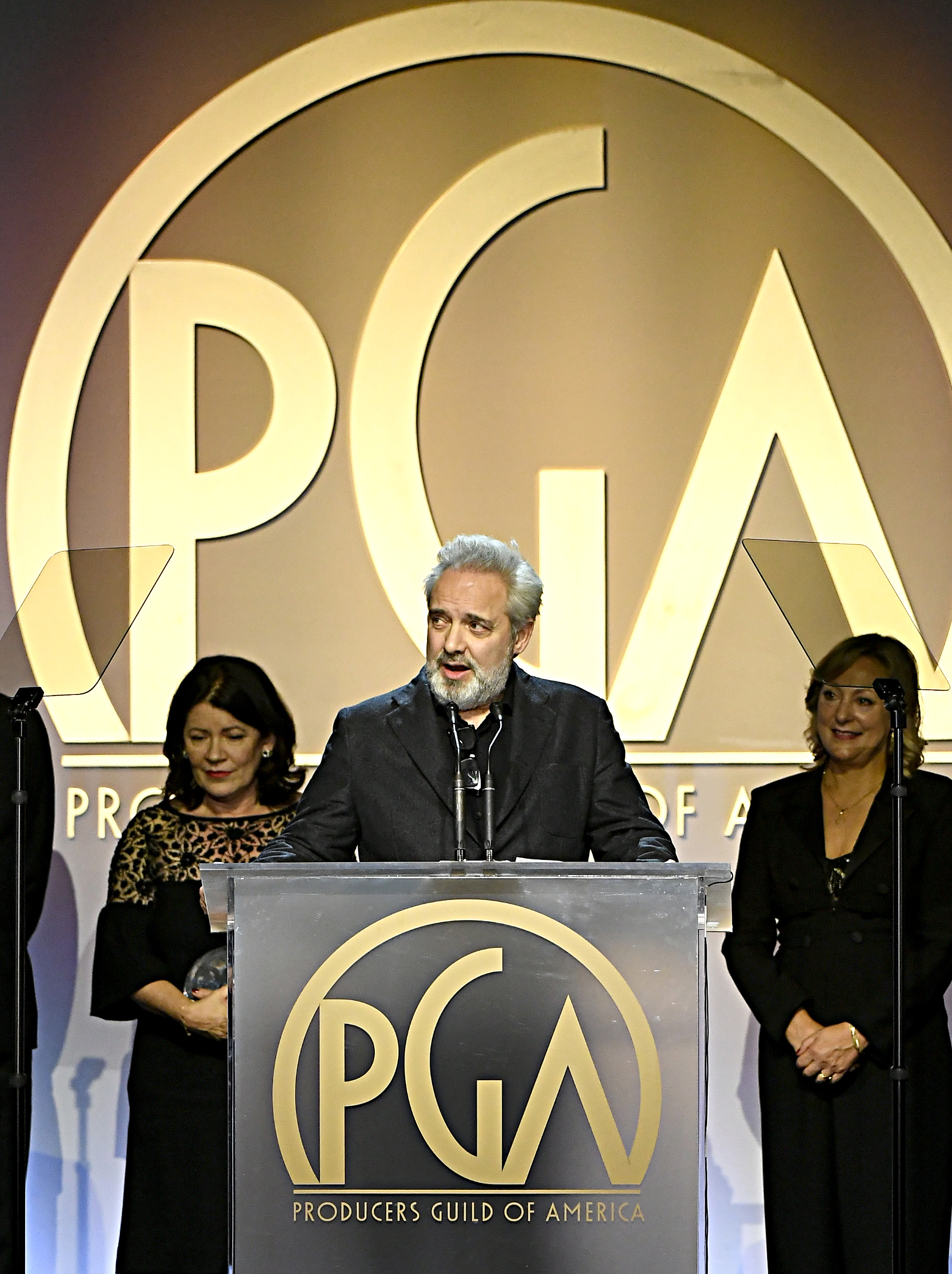 Sam Mendes accepts The Darryl F. Zanuck Award for Outstanding Producer of Theatrical Motion Pictures for ‘1917’ onstage during the 31st Annual Producers Guild Awards at Hollywood Palladium on Jan. 18, 2020, in Los Angeles.