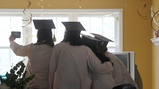 University of Massachusetts Medical School graduate Jacqueline Chipkin, far left, participates in a FaceTime video chat