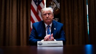 In this June 15, 2020, file photo, U.S. President Donald Trump listens during a roundtable on “Fighting for America’s Seniors” at the Cabinet Room of the White House in Washington, DC.