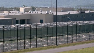 Barbed-wire fencing surrounds a prison in Pennsylvnia