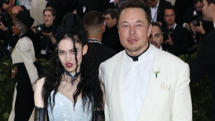 In this file photo, Grimes and Elon Musk attend "Heavenly Bodies: Fashion & the Catholic Imagination", the 2018 Costume Institute Benefit at Metropolitan Museum of Art on May 7, 2018 in New York City.