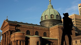 The Basilica of Saint Peter and Saint Paul, 1846-1864, in the foreground the statue of Tadeusz Kosciuszko, Philadelphia, Pennsylvania, United States of America