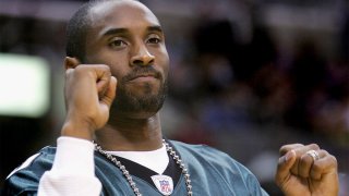 Kobe Bryant wears a Philadelphia Eagles jersey