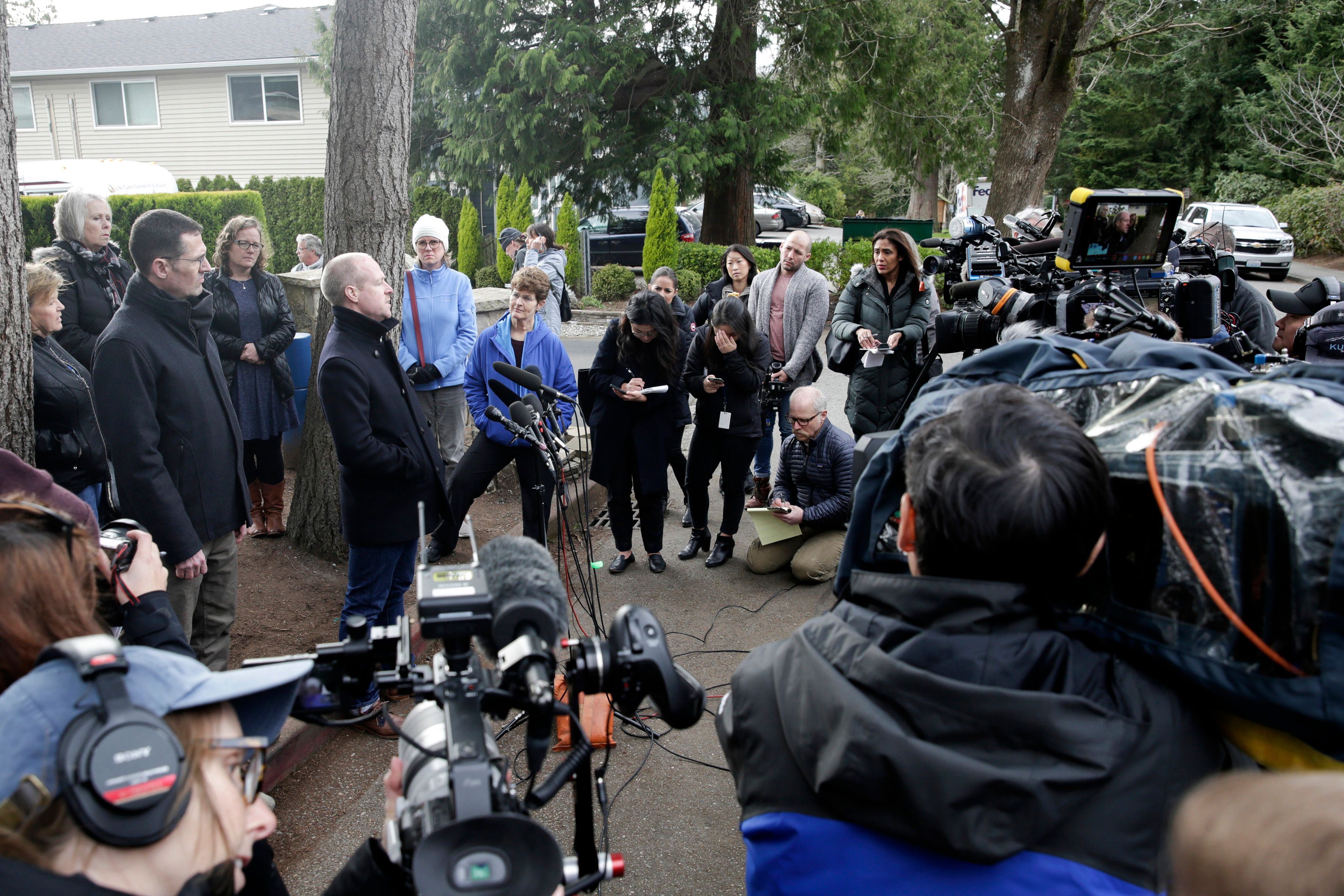 Kevin Connolly, whose father-in-law is a resident at Life Care Center, speaks during a press conference held by family of residents of the nursing home, where some patients have died from COVID-19, in Kirkland, Washington on March 5, 2020. - The US reported its first case of the disease in January and its first death on February 29 -- both in the state of Washington in the country's Pacific Northwest. Since then the toll has risen to 11 and the virus has spread to at least 14 states, infecting more than 180 people, according to an AFP tally. On March 5, Washington state officials announced a jump in cases, from 39 to 70. Ten of the 11 deaths have been reported there, with the other in California. (Photo by Jason Redmond / AFP) (Photo by JASON REDMOND/AFP via Getty Images)