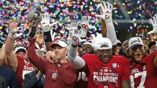Head coach Lincoln Riley of the Oklahoma Sooners celebrates with his team after defeating the Baylor Bears 30-23 in the Big 12 Football Championship at AT&T Stadium on Dec. 7, 2019 in Arlington, Texas.