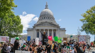 In this May 30, 2020, file photo, protesters gather on the steps of the Wisconsin Capitol during a peaceful protest in Madison, WI.