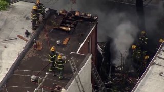 Firefighters battle flames