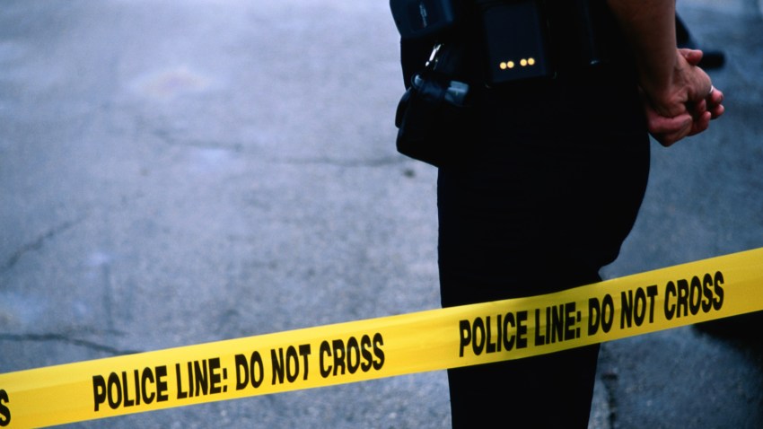 PHI crime scene tape and officer