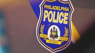 A Philadelphia police department logo shows a badge with "Philadelphia Police" written on it.