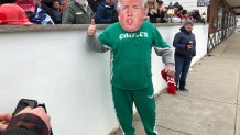 Man wearing Trump mask and Eagles gear