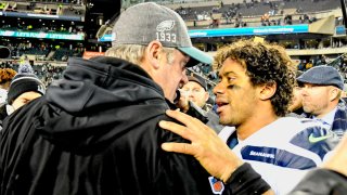 PHILADELPHIA, PA – JANUARY 05: Philadelphia Eagles head coach Doug Pederson shakes hands with Seattle Seahawks quarterback Russell Wilson (3) during the Playoff game between the Seattle Seahawks and the Philadelphia Eagles on January 5, 2020, at Lincoln Financial Filed in Philadelphia, PA.(Photo by Andy Lewis/Icon Sportswire via Getty Images)