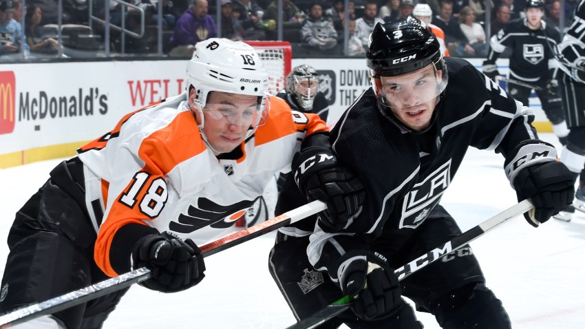Tyler Pitlick #18 of the Philadelphia Flyers and Matt Roy #3 of the Los Angeles Kings battle for position during the second period at STAPLES Center on December 31, 2019 in Los Angeles, California.