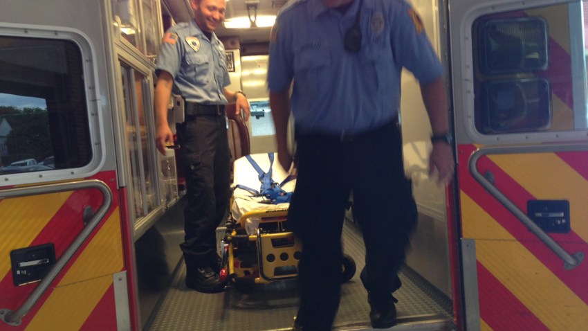 USE pic MAIN PHOTO montco second alarmers santillo and tsipenyuk in motion ambulance