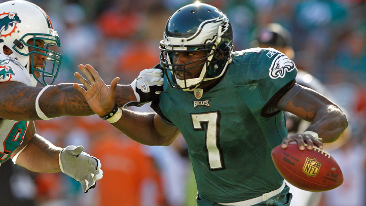 Vick Escapes Dolphins