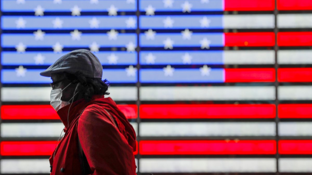 US Virus Updates Deaths Top 100K; Disney World Plans July Reopening