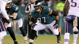 Philadelphia Eagles offensive tackle Andre Dillard (77) in action against the New England Patriots during an NFL football game