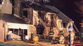 A house is burned after a deadly fire in Bucks County, Pennsylvania.