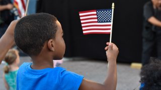 child with american flag