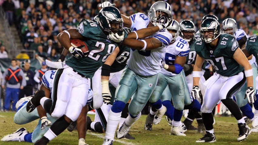 Correll Buckhalter #28 of the Philadelphia Eagles runs the ball against Anthony Spencer #93 of the Dallas Cowboys on December 28, 2008 at Lincoln Financial Field in Philadelphia, Pennsylvania