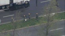 firefighters at oil spill levick blvd