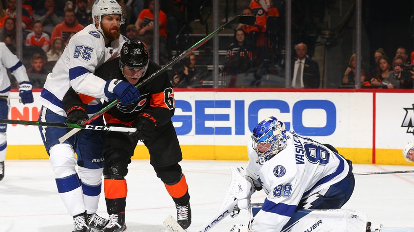 Andrei Vasilevskiy #88 of the Tampa Bay Lightning makes a save in front of Nicolas Aube-Kubel #62 of the Philadelphia Flyers and Braydon Coburn #55 of the Tampa Bay Lightning in the third period at the Wells Fargo Center on January 11, 2020 in Philadelphia, Pennsylvania