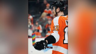 Michael Raffl #12 of the Philadelphia Flyers looks on during warmups prior to his game against the Washington Capitals on January 8, 2020 at the Wells Fargo Center in Philadelphia, Pennsylvania. Raffl's stick is taped in rainbow colors for Pride Night.