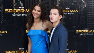 Zendaya (left) and Tom Holland attend 'Spider-Man: Homecoming'