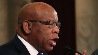 In this Jan. 11, 2017, file photo, Rep. John Lewis, D-Ga., reads a statement speaking out against then Attorney General nominee Jeff Sessions during a Senate Judiciary Committee hearing in Washington.