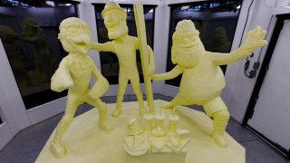 A butter sculpture depicts Gritty, Swoop and Steely McBeam, mascots for the Philadelphia Flyers and Eagles, and the Pittsburgh Steelers.