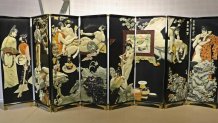 Various depictions of unclothed women on a black background, spread across the eight panels.