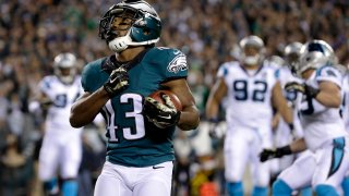Philadelphia Eagles' Darren Sproles reacts after scoring a touchdown during the first half of an NFL football game against the Carolina Panthers