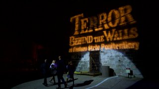 Visitors arrive at "Terror Behind the Walls" haunted house on October 24, 2017 in Philadelphia, Pennsylvania.