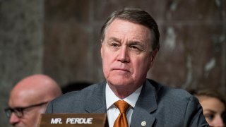 UNITED STATES - DECEMBER 3: Sen. David Perdue, R-Ga., listens during the Senate Armed Services Committee hearing on privatized military housing on Tuesday, Dec. 3, 2019.