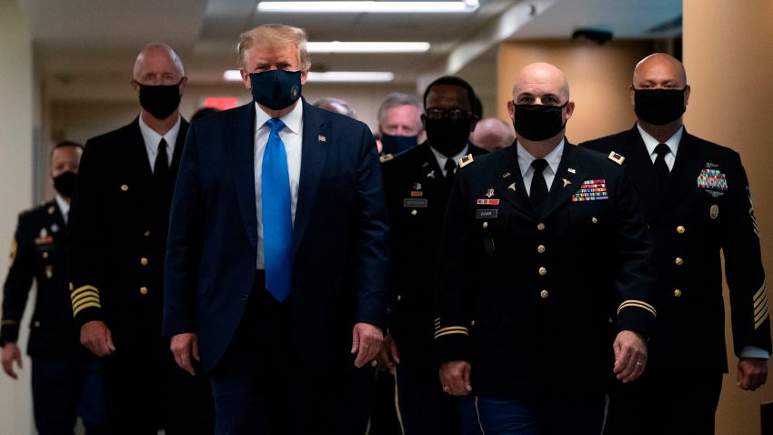 US President Donald Trump wears a mask