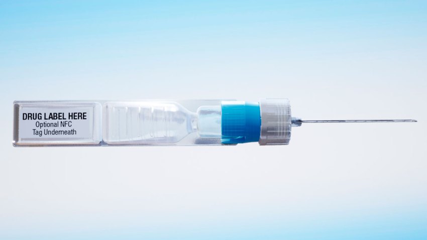 This undated image provided by ApiJect Systems America in July 2020 shows a prototype of their "BFS" prefilled syringe. The devices are self-contained: the soft plastic blister is squeezed to push a dosage through the attached needle to inject into a patient. It also includes a computer chip that can transmit information about the drug, dose, location and time of administration. When precious vats of COVID-19 vaccine are finally ready, the ability to jab the lifesaving solution into the arms of Americans will require hundreds of millions of injections. The Trump administration has agreed to invest more than half a billion in tax dollars in ApiJect Systems America, a young company whose injector is not approved by federal health authorities and who hasn’t yet set up a factory to manufacture the unapproved devices.