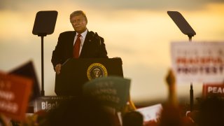 U.S. President Donald Trump speaks during a campaign rally at the Pro Star Aviation hangar in Londonderry, New Hampshire, U.S., on Friday, Aug. 28, 2020. Trump took aim at people protesting racism and police brutality, saying they are just looking for trouble and dont know about the killing of a Black man at the hands of police in Minneapolis that led to demonstrations nationally.