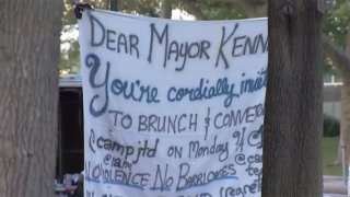 A banner inviting Mayor Kenney to brunch