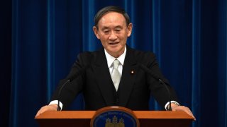 Japan's new Prime Minister Yoshihide Suga speaks during a press conference at the prime minister's official residence Wednesday, Sept. 16, 2020 in Tokyo, Japan. Suga, who was elected on Wednesday after gaining support for his pledges to pursue his predecessor Shinzo Abe's policies formed his 20-member Cabinet that retains many familiar faces, signaling continuation of Abe's line.