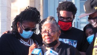 Carol Sanders speaks on the fatal shooting of her son, Hasani Best, in Asbury Park N.J., Sept. 23, 2020. Family and friends of Hasani Best rallied and called on New Jersey authorities to bring criminal charges against one or more police officers involved in his fatal shooting last month.