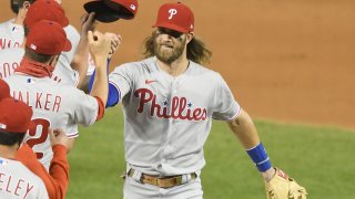 Bryce Harper of the Philadelphia Phillies celebrates a win after a baseball game against the Washington Nationals